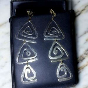 Elegant Silver Spiral Clip On Earrings